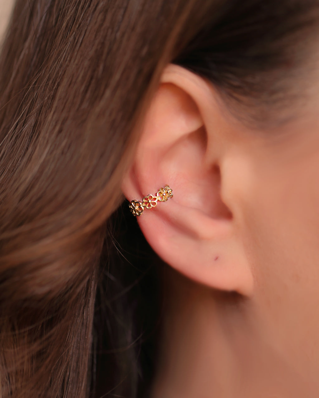 Gold flower ear cuff by Verendi