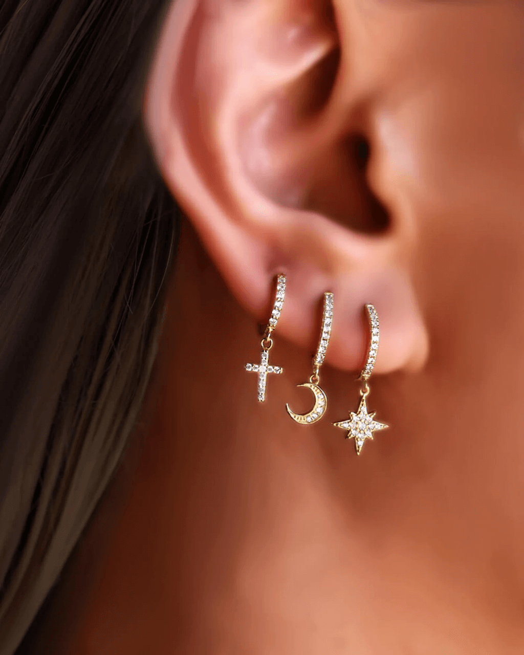 huggie hoops, silver moon and star ear hoops, cross earrings