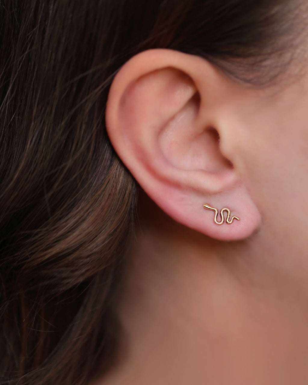 Snake ear studs in gold by Verendi